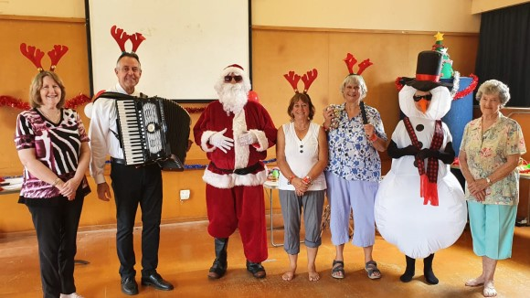 Christine Johnstone, Kevin Friedrich, Santa, Ros Gilmour, Linda Emmet Litt, Frosty and Margaret Tier.
