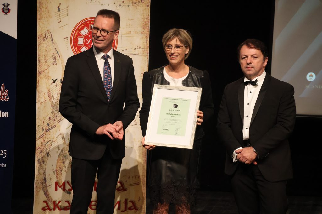 Nathalie Boucheix presented the 2025 CIA Merit Award, left Kimmo Mattila, right Mirco Patarini