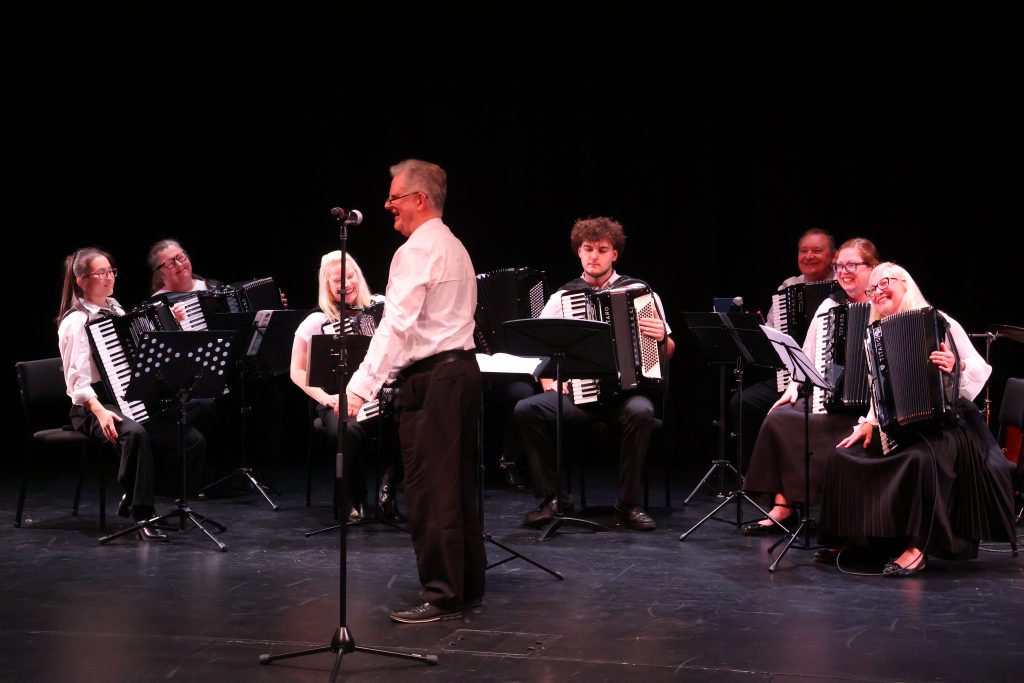 Conductor Bryan Holden and the North Shore Accordion Orchestra
