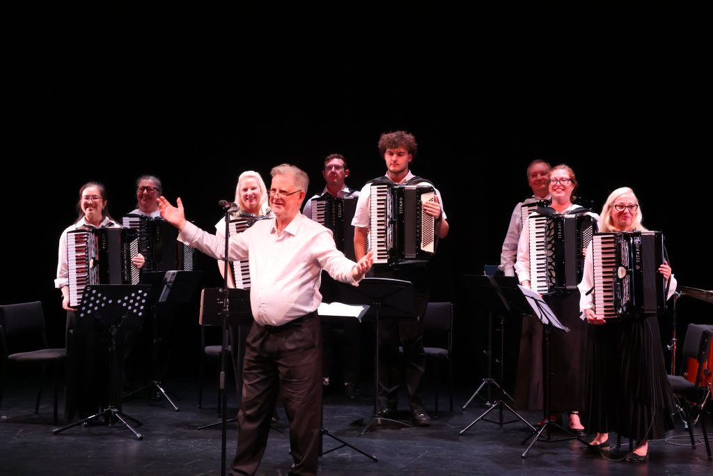 Conductor Bryan Holden and the North Shore Accordion Orchestra