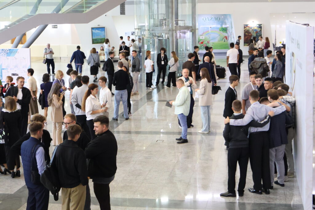 candidates and teachers in the foyer before draw